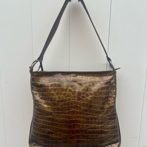 Brighton shoulder bag. Shiny embossed golden brown.